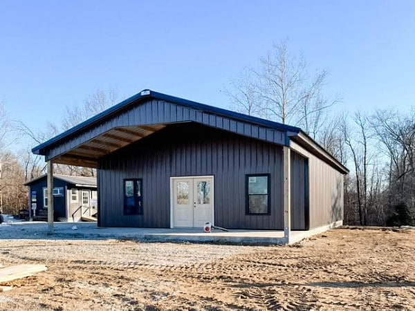 small barndominium with covered porch